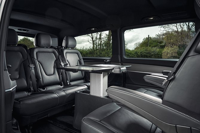 Airport Transfer: Milan to Malpensa Airport MXP by Luxury Van - Meet & Greet pickup: the name sign that saves your brain