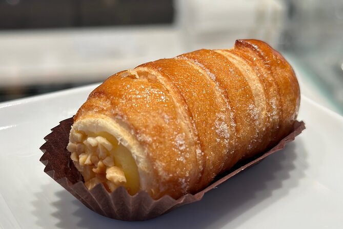 Eating Milan Street Food Tour with Guided Tasting and Sightseeing - Piazza Mercanti: medieval Milan’s former center