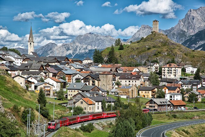 From Milan: Bernina Express Day Trip to Tirano & St. Moritz - The Bernina Red train: where the day becomes unforgettable