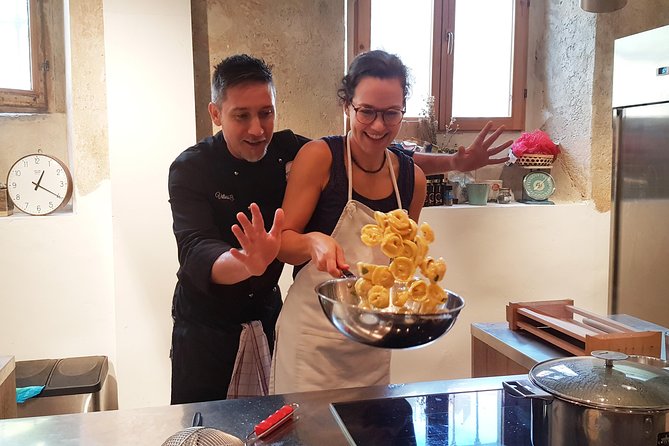 Italian Cocktail + Art of Making Pasta Cooking Class In Unique Milan Location - Entering the kitchen in central Milan (and why the meeting point is useful)