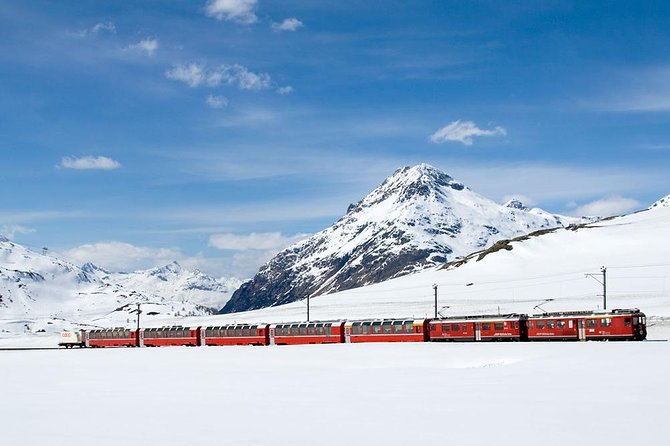 Lake Como Cruise, St. Moritz & Bernina Red Train Tour from Milan - Luxury coach comfort, headphones, and the reality of long rides