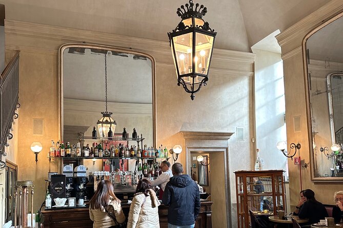 Milan Coffee & History Crawl with a Licensed Tour Guide - Piazza Mercanti: medieval Milan and a detail most people miss