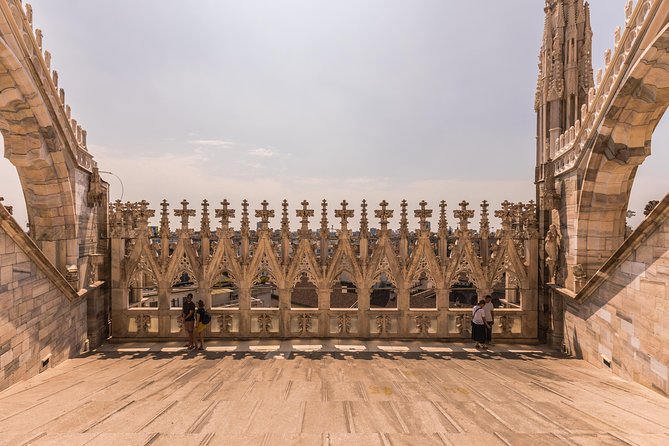 Milan Duomo Rooftop Terrace Guided Tour - Stop on the Terrazze: Why Those 3,400+ Statues Matter