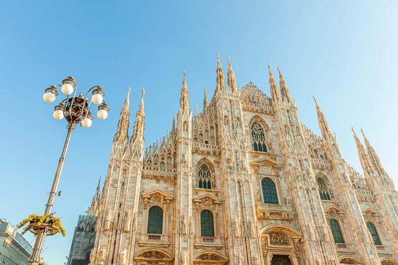 Milan: Fast Track Cathedral and Duomo Rooftop Guided Tour - Meeting Under Mondadori: How to Find the Group Fast