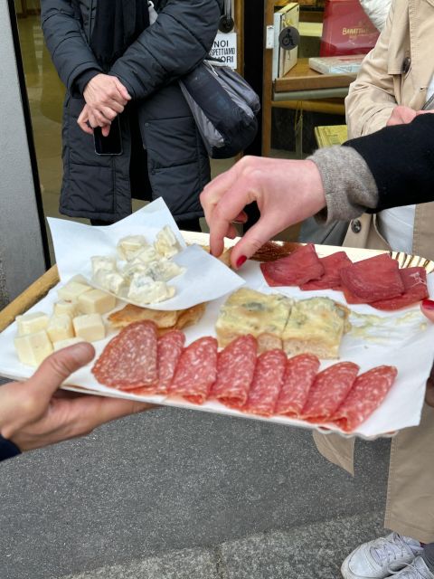 Milan: Gourmet Street Food Tour with Sightseeing and Tasting - The walk through Milan highlights, including Sforza’s Castle