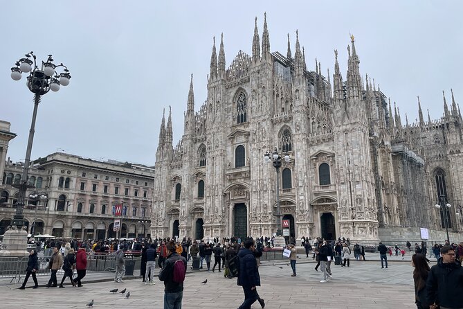 Milan History & Street Food Tour with Wine Tasting - Piazza Cordusio: historic buildings and an easy reset
