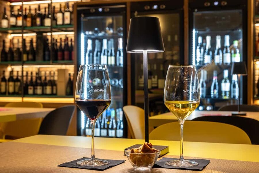 Milan: Wine Tasting Experience with Platter - A cozy Città Studi enoteca setup, with real hospitality