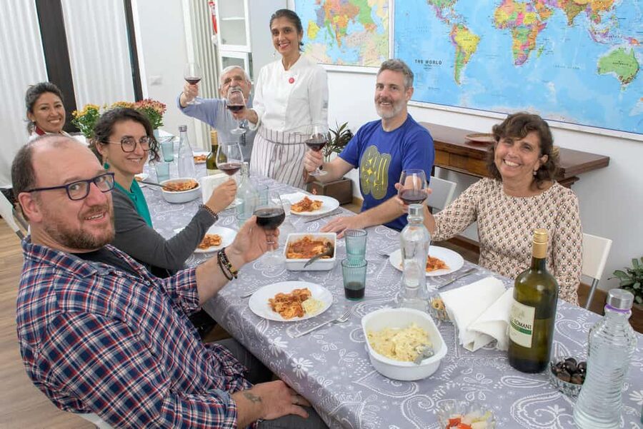 only in ITALIAN - International aperitif + cooking class in Italian - The big payoff: tasting what you made with wine