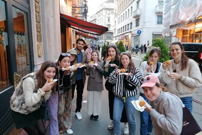 Tasty Milan Street Food Tour with Local Guide - L.O.V.E and Il dito: modern art in the middle of business Milan